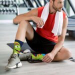 Dino Playing Roller Skate for Mid-Calf Athletic Socks for Men Women, Breathable Moisture Wicking Sports Socks, Cushioned Running Training Socks for Sports